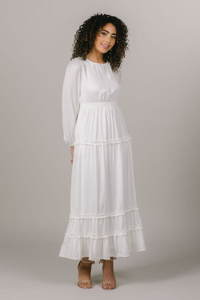 This is a modest temple dress typically worn by those who are a part of the Church of Jesus Christ of Latter-day Saints.