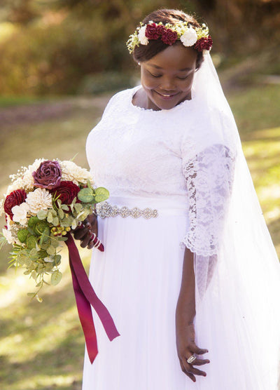 Plus size real bride wearing a Modest chiffon wedding dress,, style Haven, is part of the Wedding Collection of LatterDayBride, a Salt Lake City bridal store.