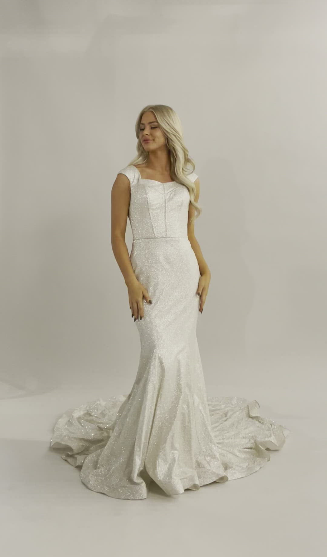 A video of glitter dress. Modest Wedding Dress - Plus Size Modest Wedding Dress - Temple Dresses