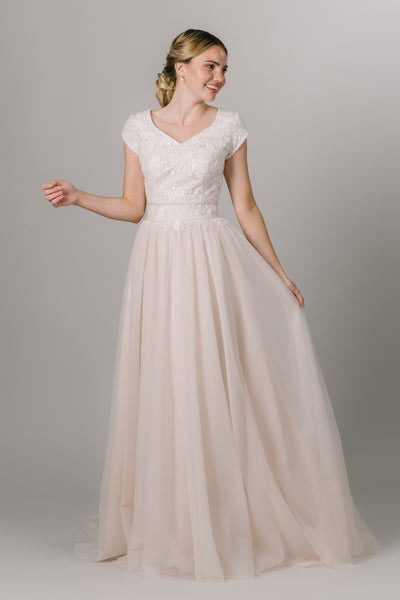 This Modest Wedding Dress is so fun with a ballgown fit, V-neckline, and sparkle bodice. - Modest Wedding Dresses - Modest Dresses - Modest Clothing - LatterDayBride