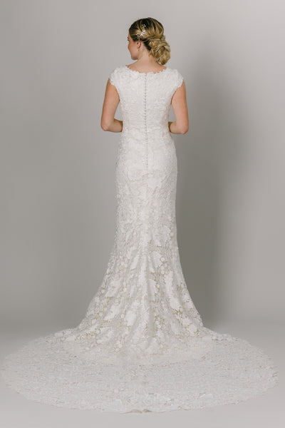 This Modest Wedding Dress features short sleeves, a round neck and an all over lace. - Modest Wedding Dresses - Modest Clothing - Modest Dresses - LatterDayBride