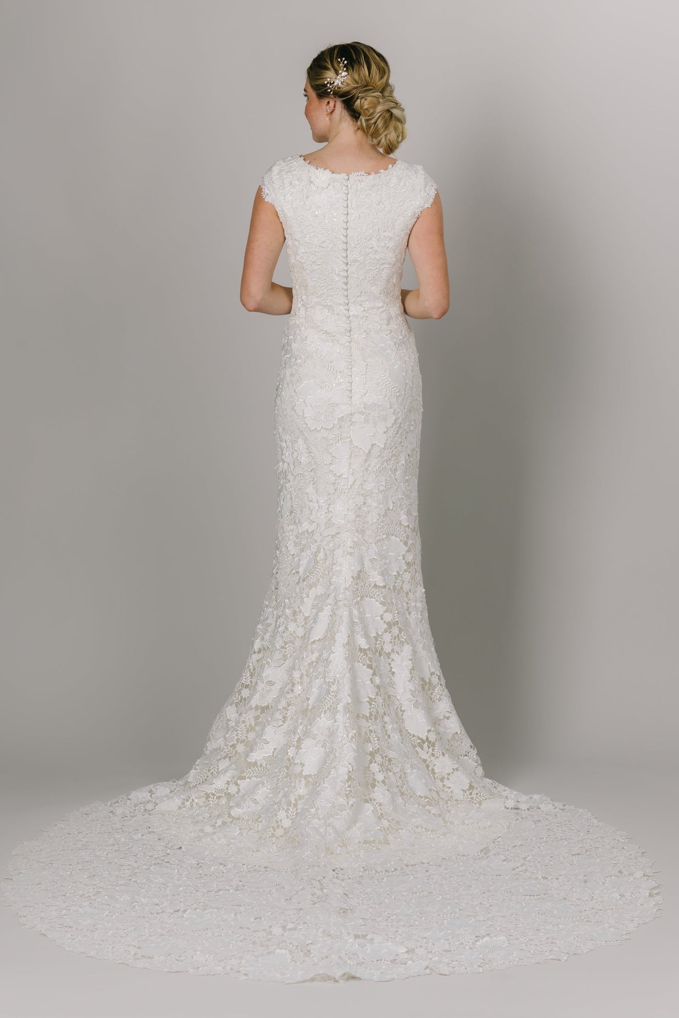 This Modest Wedding Dress features short sleeves, a round neck and an all over lace. - Modest Wedding Dresses - Modest Clothing - Modest Dresses - LatterDayBride