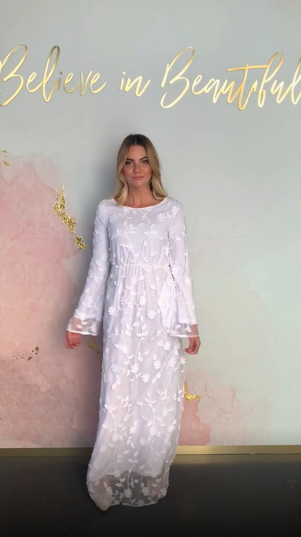 A video featuring our Kona temple dress and highlighting its unique embroidered lace pattern, and beautiful sleeves.