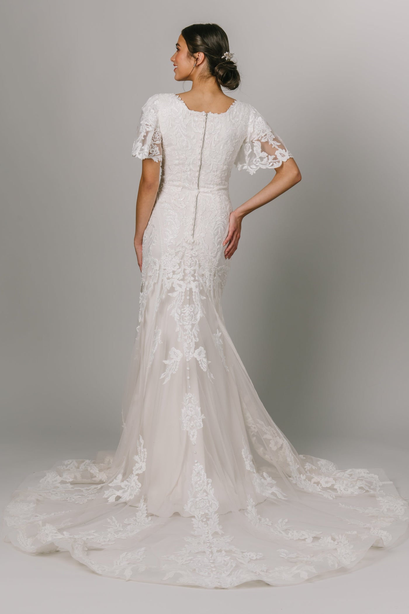 This Modest Wedding Dress features a round neckline and flutter sleeves with a fit and flare fit - Modest Wedding Dresses -Modes Dresses - Modest Clothing - LatterDayBride