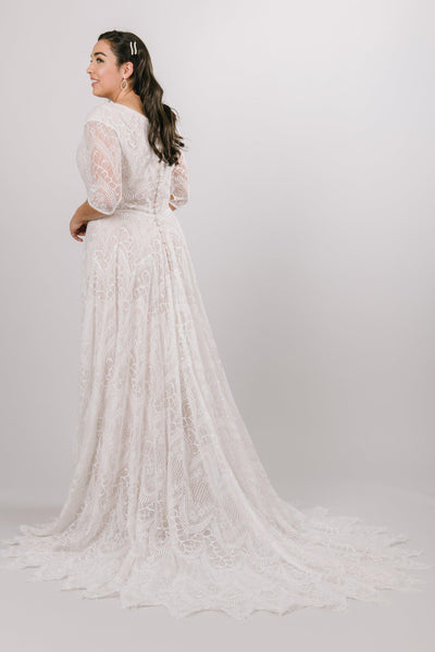 Back view of a modest wedding ballgown with lace details from LatterDayBride, a modest wedding dress shop in Salt Lake City, Utah