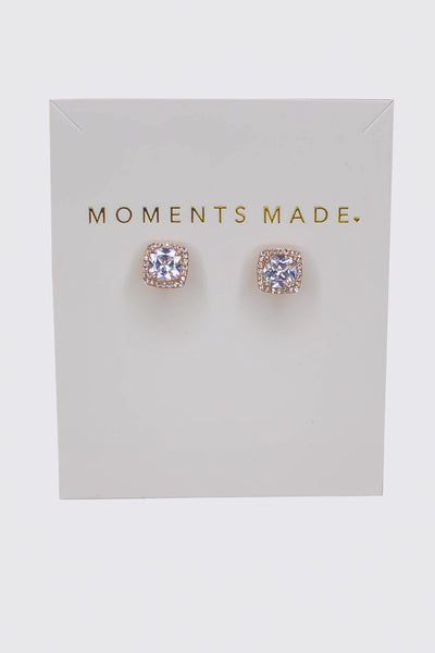 The rose gold earring is a cushion-cut crystal with a halo design.