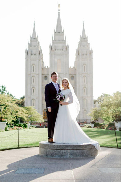 Real bride wearing a Modest chiffon wedding dress,, style Haven, is part of the Wedding Collection of LatterDayBride, a Salt Lake City bridal store.