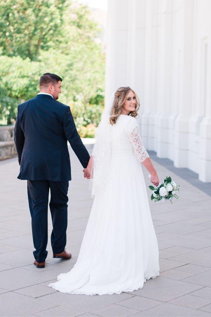Real bride wearing a Modest chiffon wedding dress,, style Haven, is part of the Wedding Collection of LatterDayBride, a Salt Lake City bridal store.