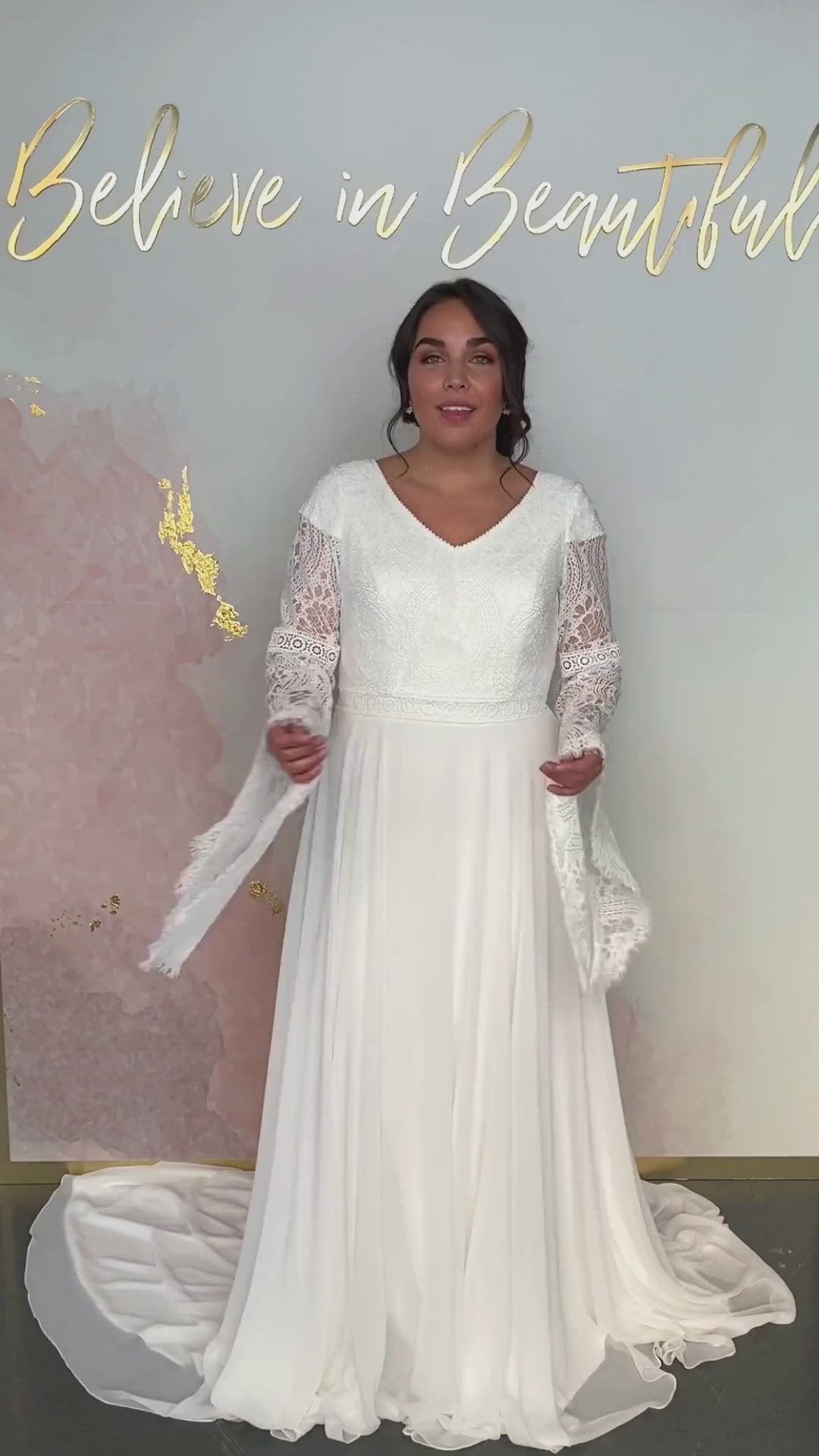 A video featuring our Merida wedding dress and its billowing lace bell sleeves, and flowy chiffon A-line skirt.