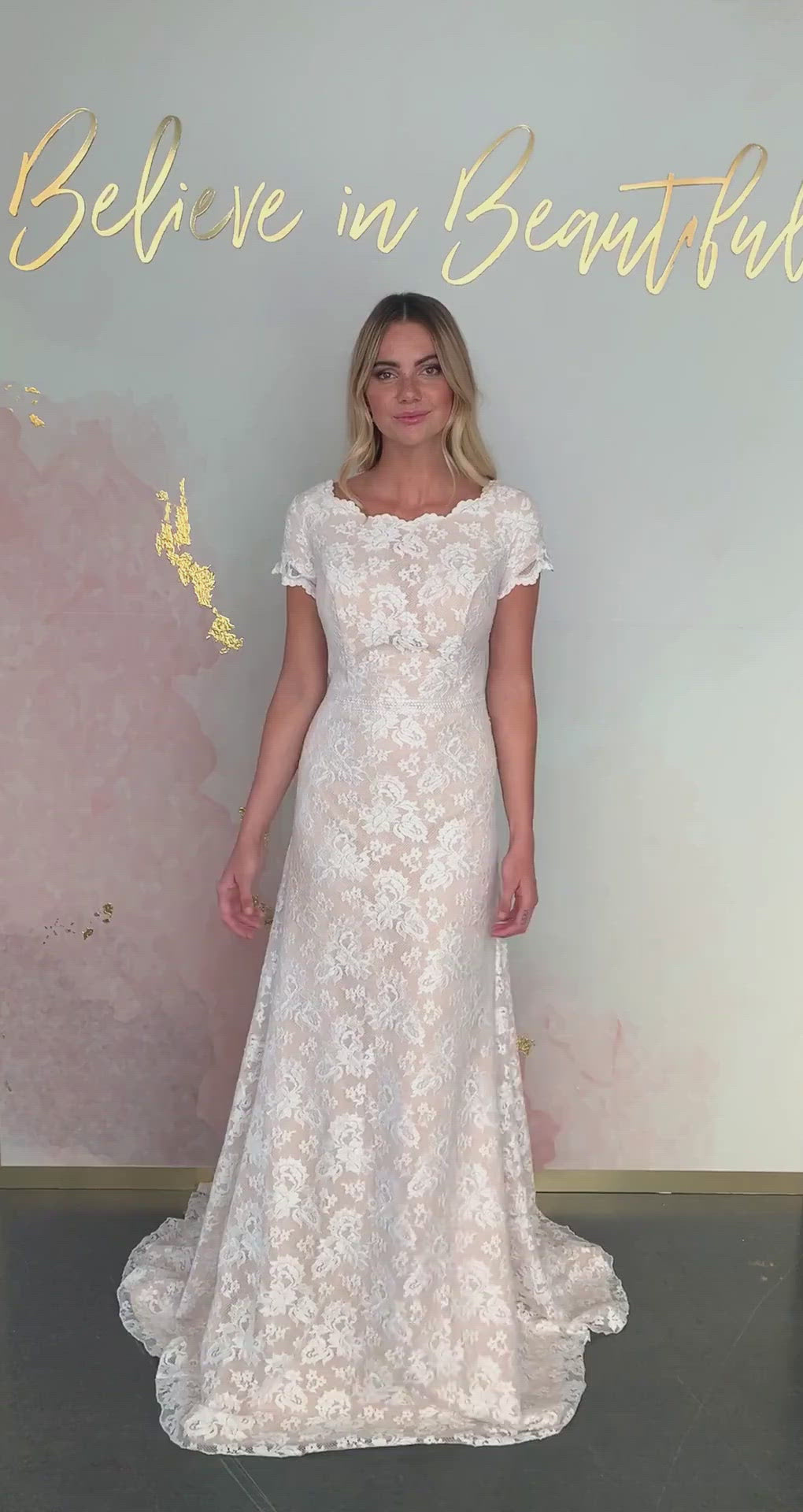 A video featuring our Hazel wedding dress and its scalloped lace detailing along the sleeves and neckline, and its flattering subtle A-line fit.