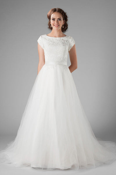 The delicate petal sleeves, the wide boat neckline and the flattering cinched waist, modest wedding dresses salt lake, front view 