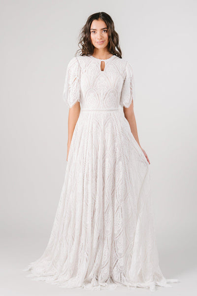 Lace modest wedding dress with flutter sleeves from LatterDayBride, a modest wedding dress shop in Salt Lake City, Utah.