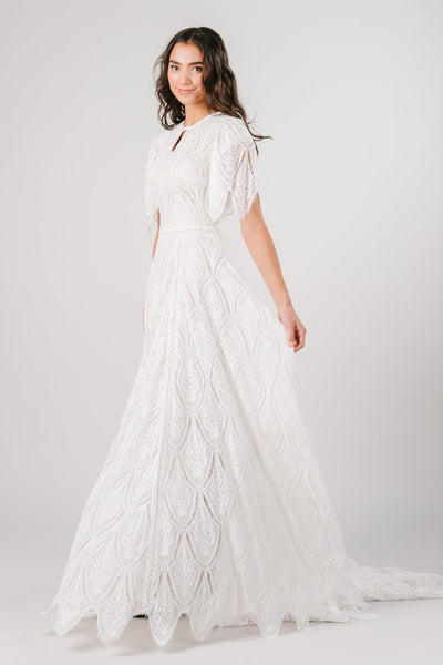 Lace modest wedding dress with flutter sleeves from LatterDayBride, a modest wedding dress shop in Salt Lake City, Utah.