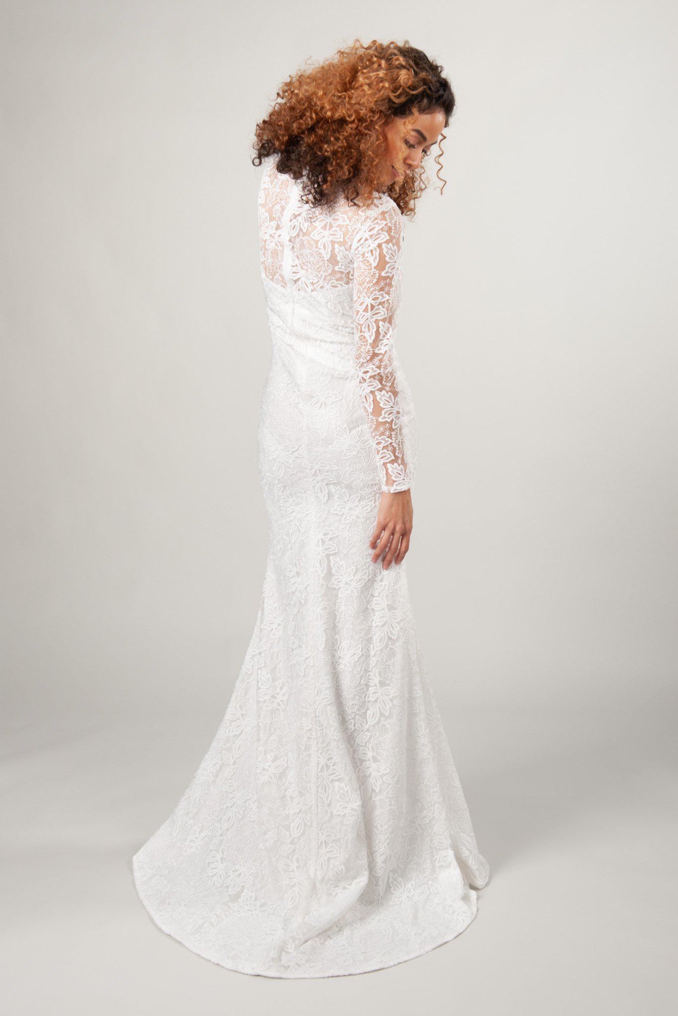 back view of the Hailey in ivory with lace and mermaid silhouette
