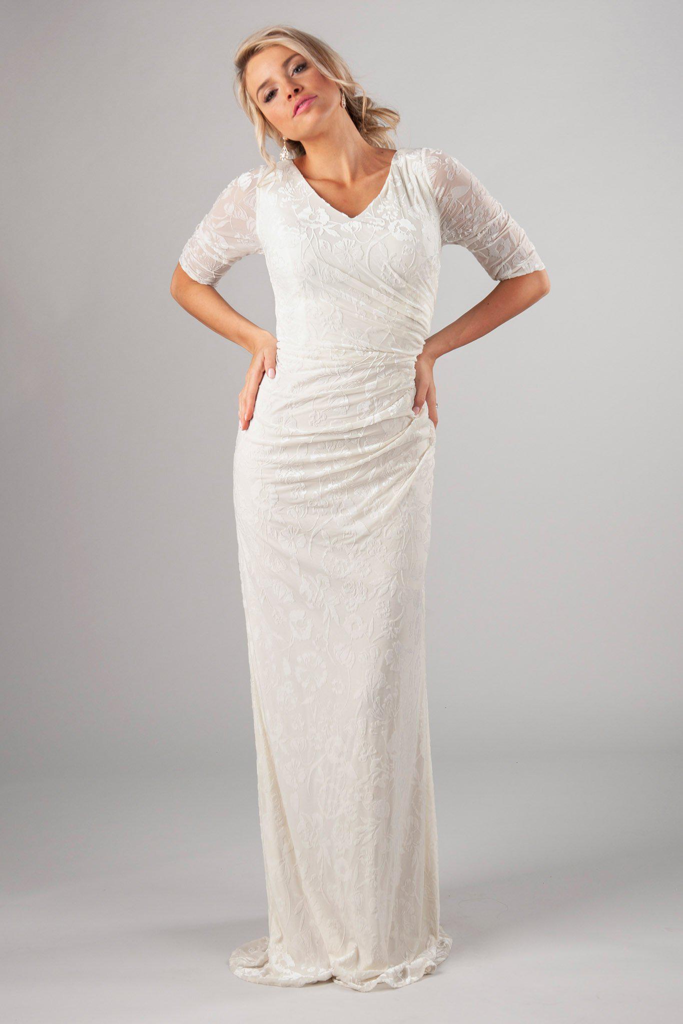 Soft and velvet bridal gown, style Katniss, is part of the Wedding Collection of LatterDayBride, a Salt Lake City bridal store.