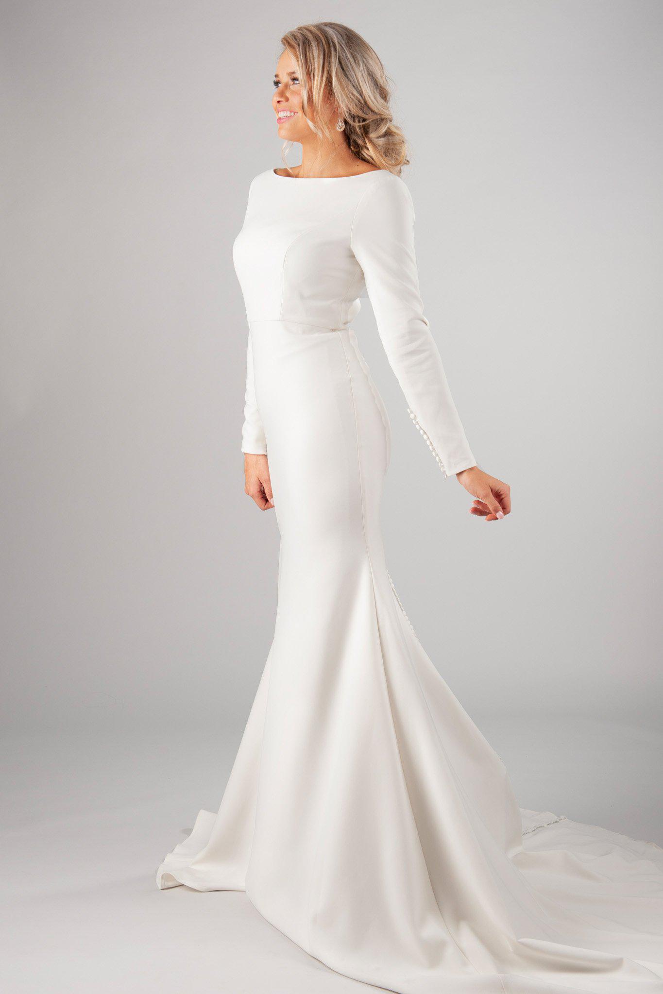 Modest long sleeve bridal gown, style Markella, is part of the Wedding Collection of LatterDayBride, a Salt Lake City bridal shop.