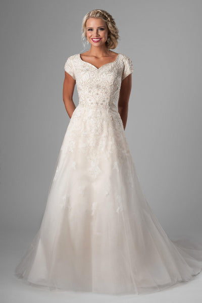 modest wedding gown. We love the bedazzled bodice, changing to soft flowing lace on the tulle skirt, salt lake city, front view