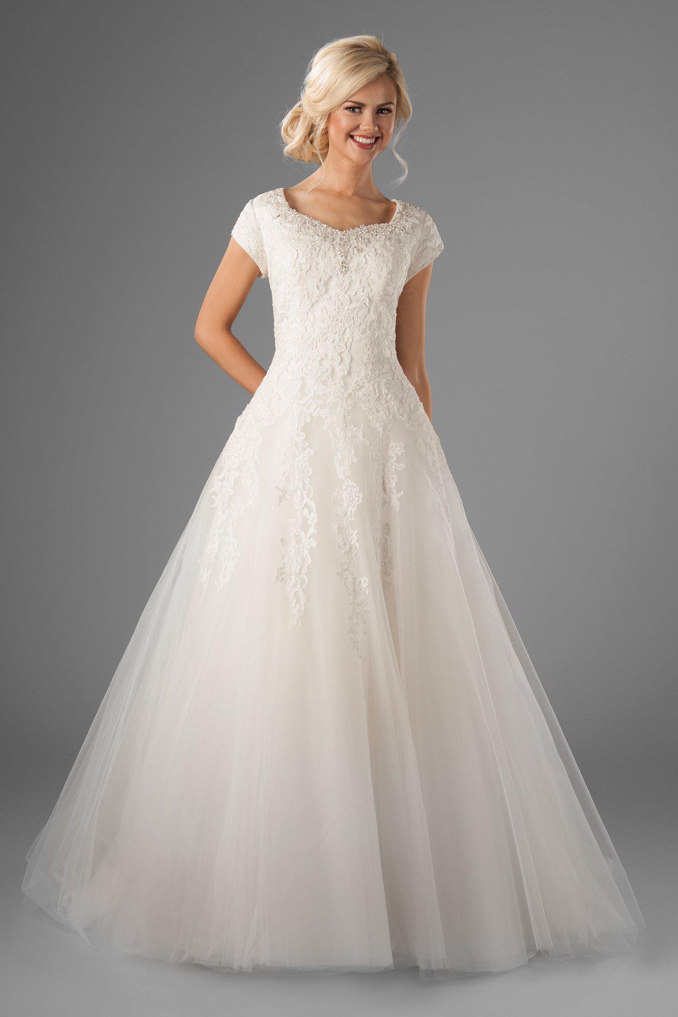 Modest ballgown wedding dress, style Juniper, is part of the Wedding Collection of LatterDayBride, a Salt Lake City bridal shop.
