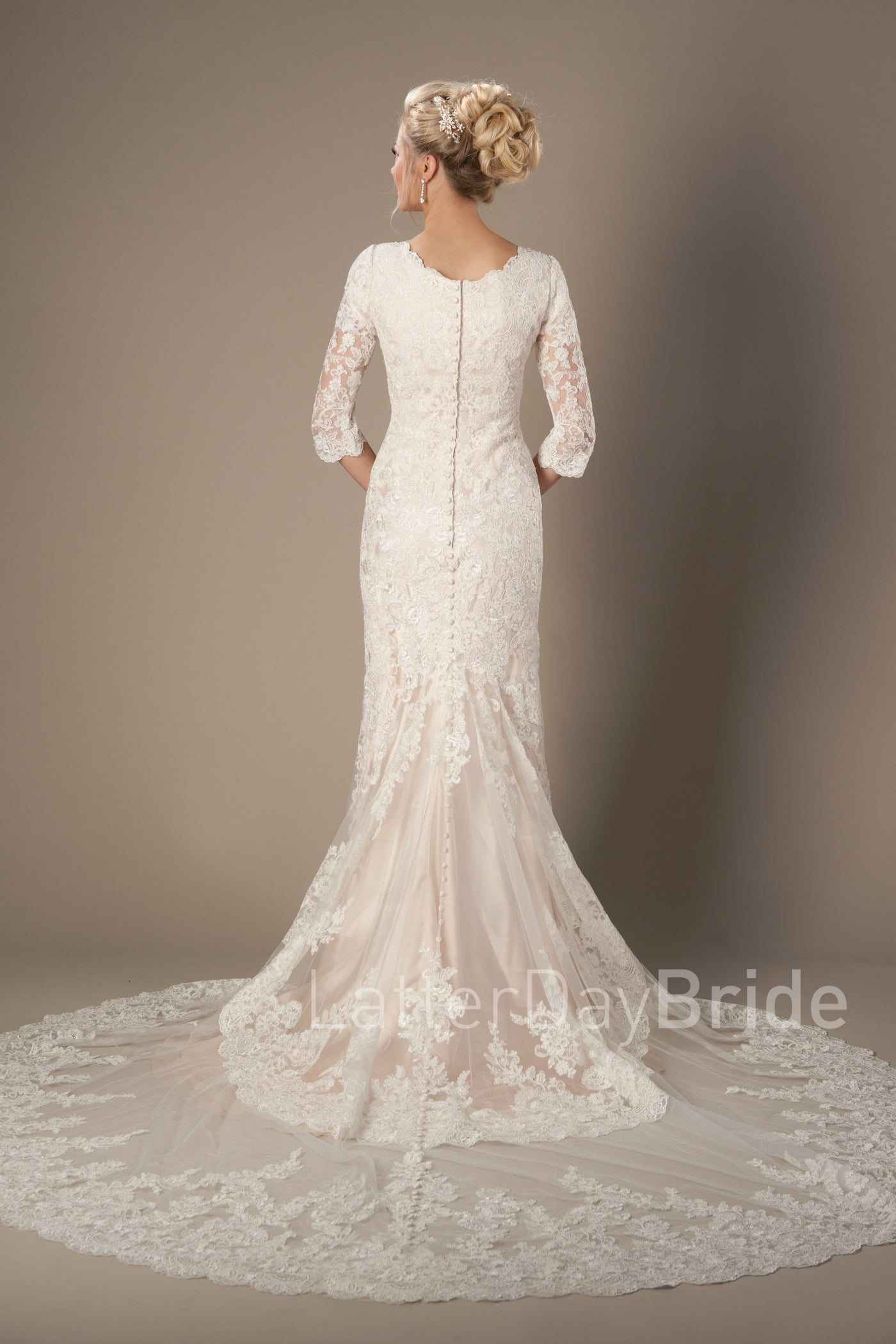 Back of Modest wedding gown with illusion lace sleeves, style Romero, is part of the Wedding Collection of LatterDayBride, a Utah Wedding Shop. 