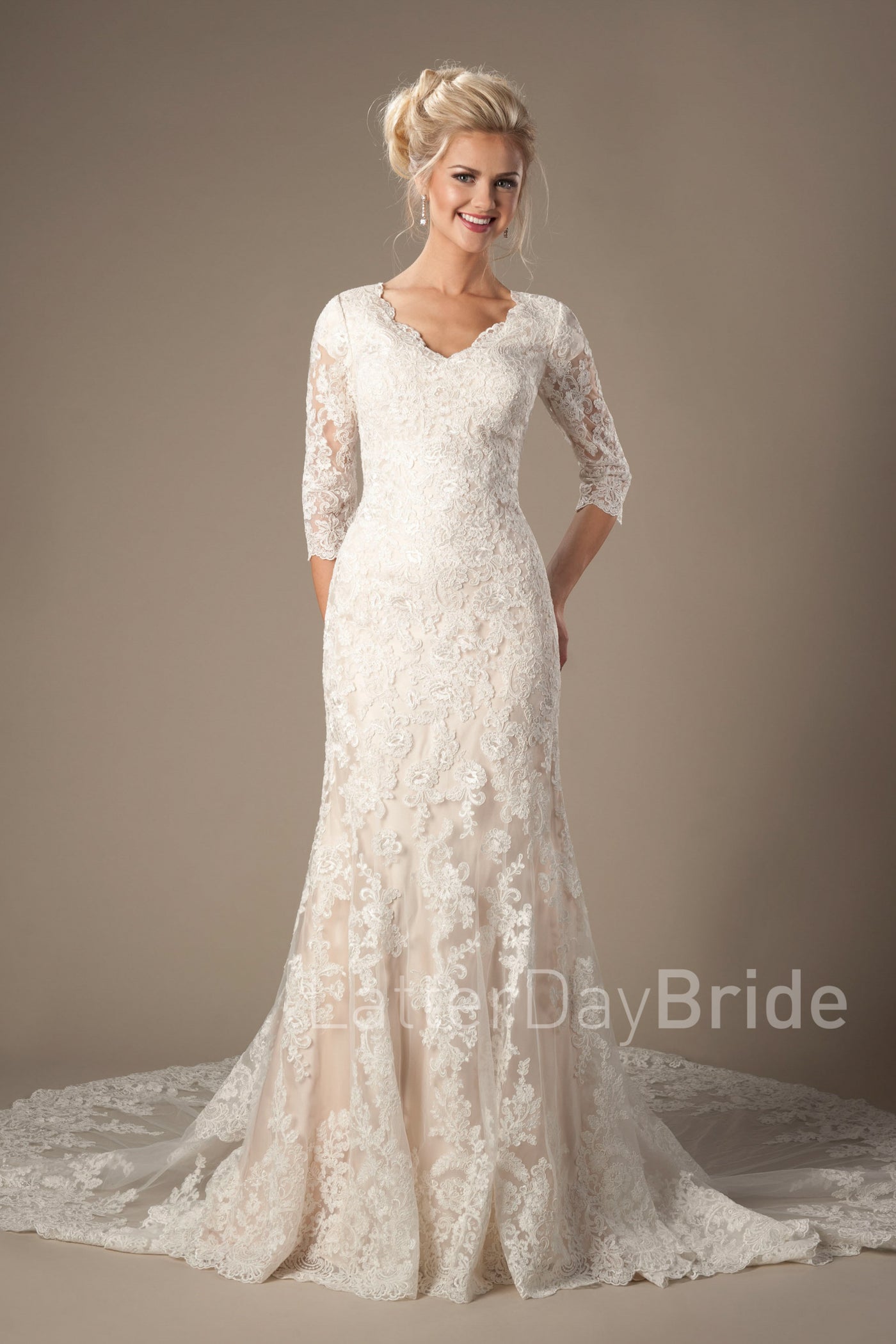 Modest wedding gown with illusion lace sleeves, style Romero, is part of the Wedding Collection of LatterDayBride, a Utah Wedding Shop. 