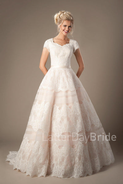 Satin waistband and tiered A-line skirt modest wedding gown, style Rosetta, is part of the Wedding Collection of LatterDayBride, a Utah Wedding Shop. 