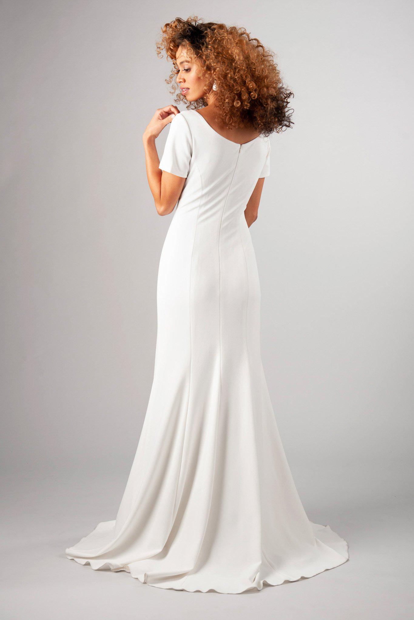 Simple lines, darling sleeve and the freeing stretch of this fabric, modest wedding dress, utah wedding gowns, back view 