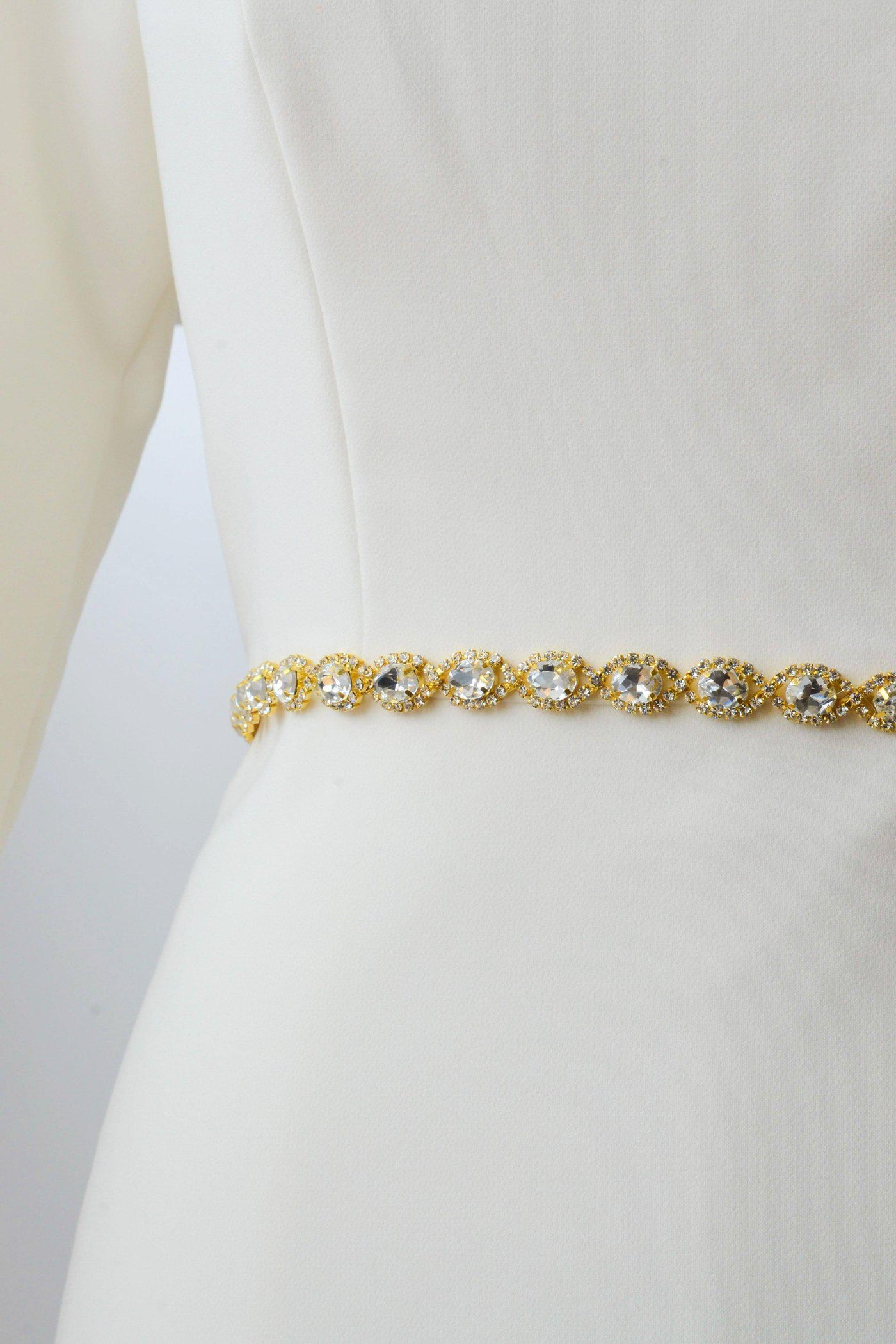 Gold metal belt accented with crystals from bridal shop in Salt Lake City Utah