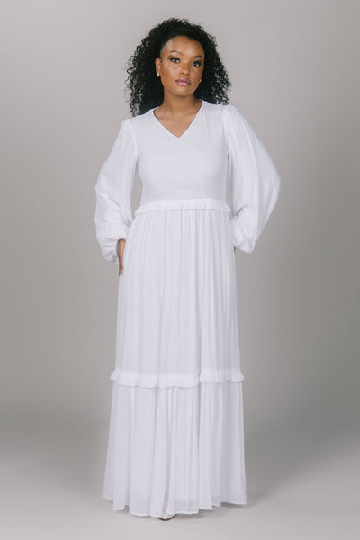 Temple dress featuring a v-neckline and bishop sleeves. It has a tiered skirt and is super comfy! Super soft temple dress.