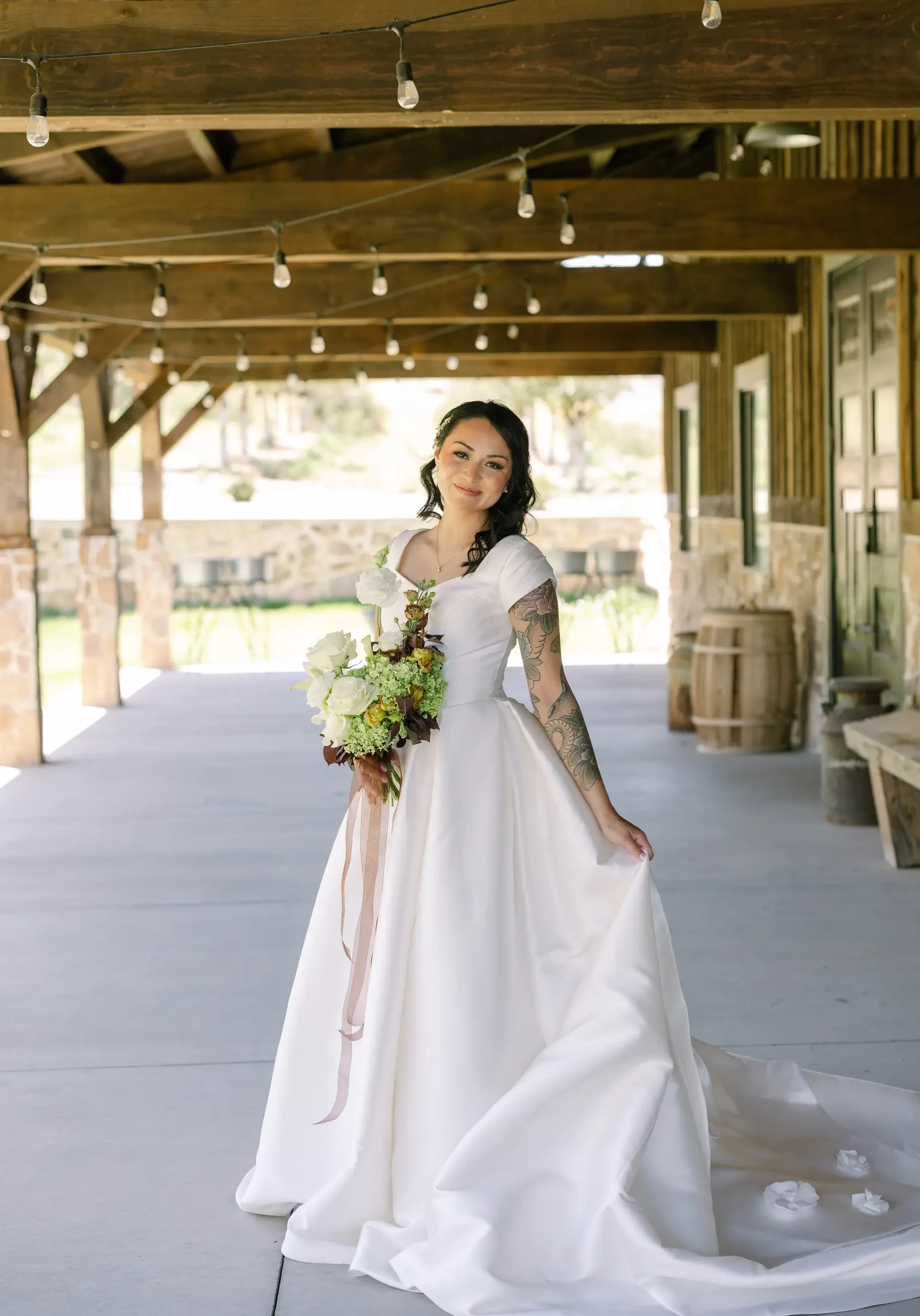 How much should you spend on a modest wedding dress in 2026?. Desktop Image