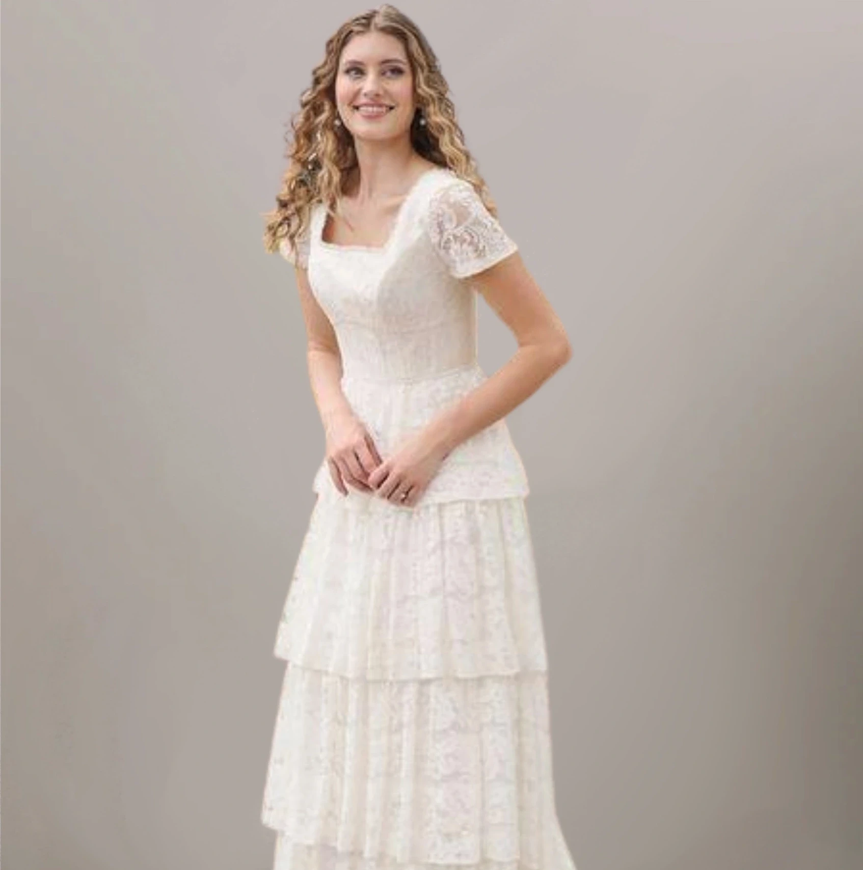 Model wearing an Modest Dresses Under $1000 gown