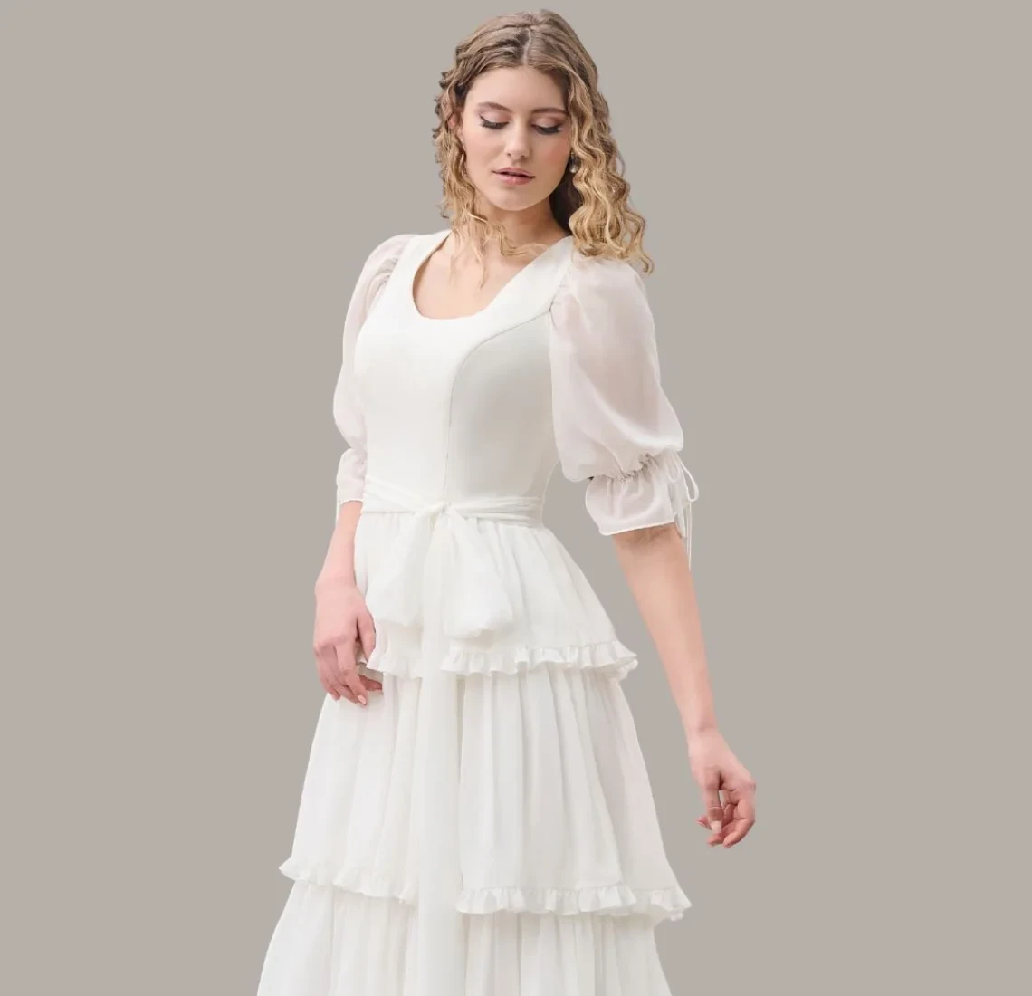 Model wearing an Modest Dresses Under $1000 gown
